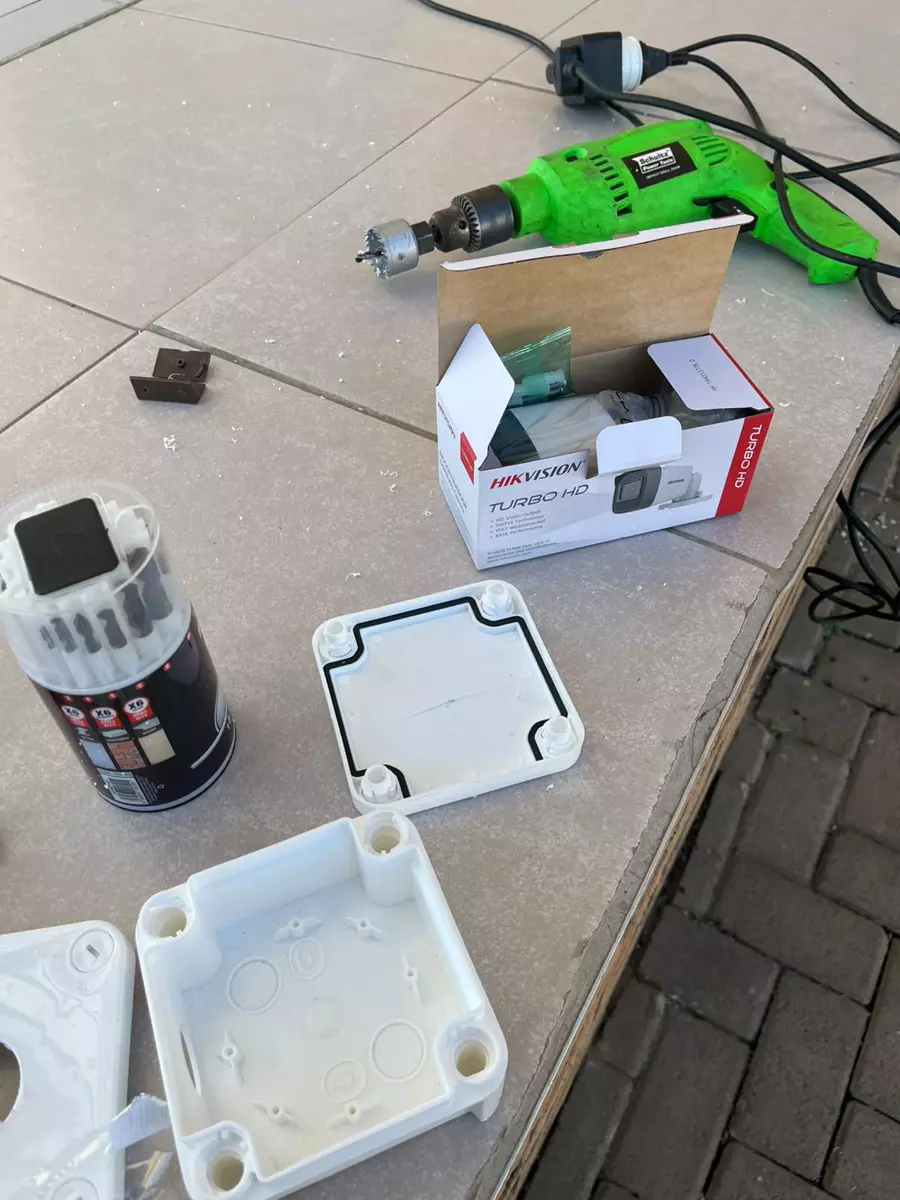 Security camera installation equipment on tiled floor