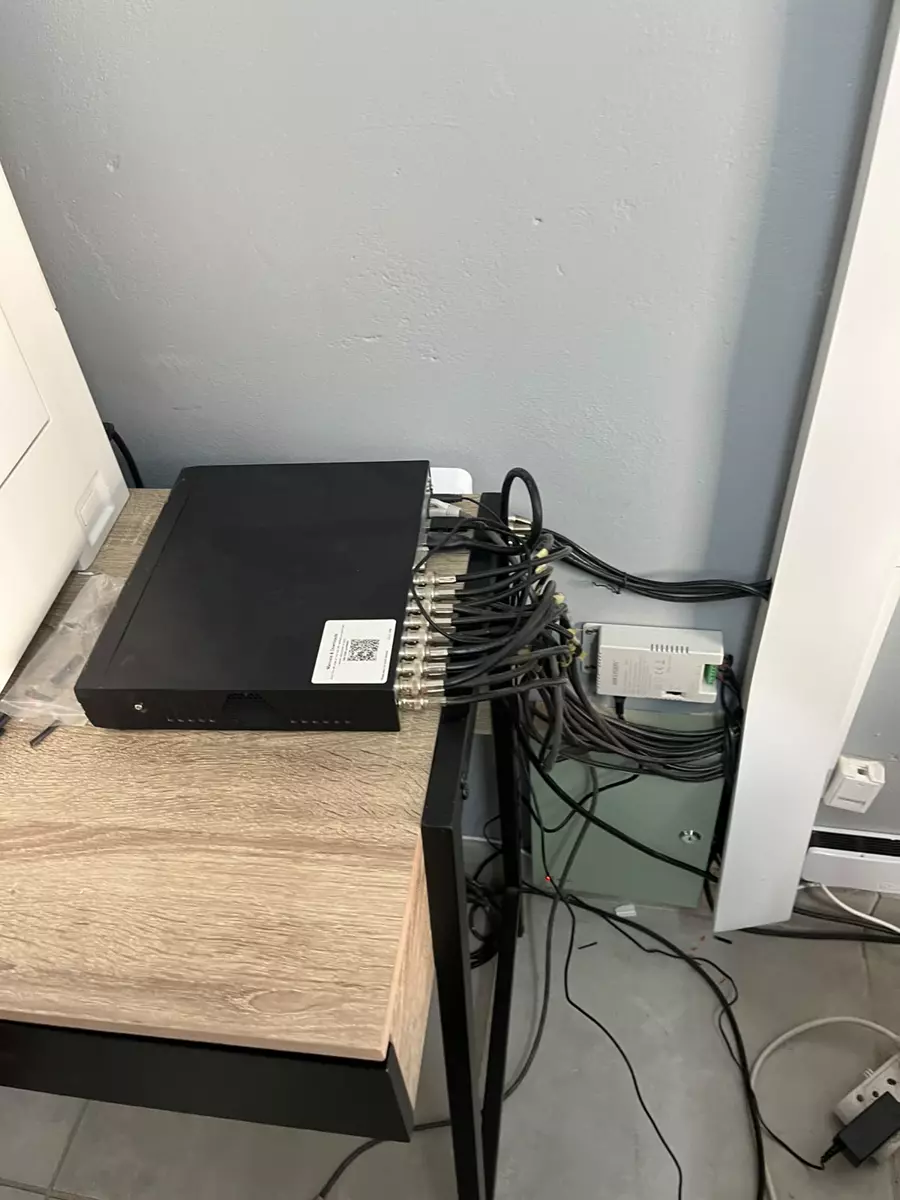 Network equipment on desk with cables